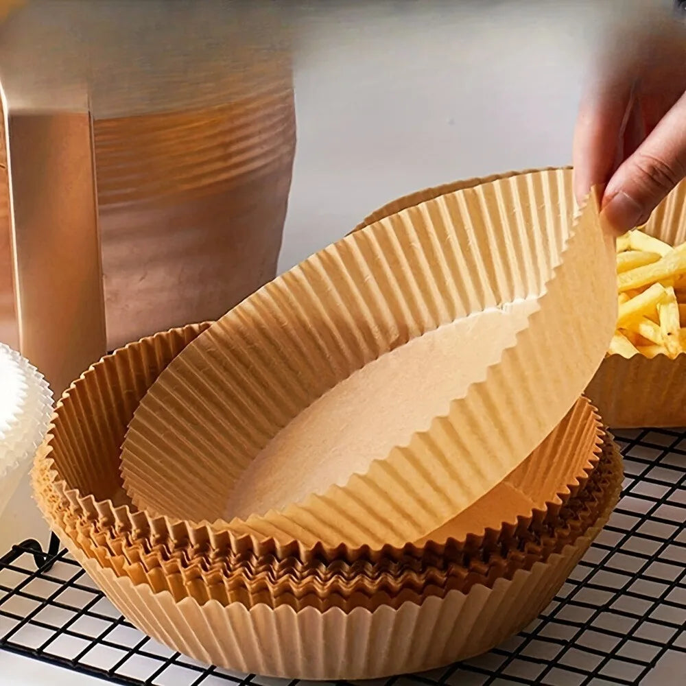 50pcs fifty disposable round baking parchment papers. a large, convenient quantity of non-stick liners for oven use.