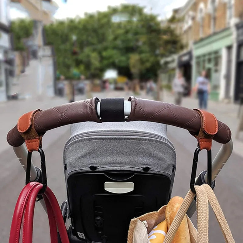 Gancho para Cochecito de Bebé | Cuero PU Ajustable | Organizador de Bolsas y Pañaleras