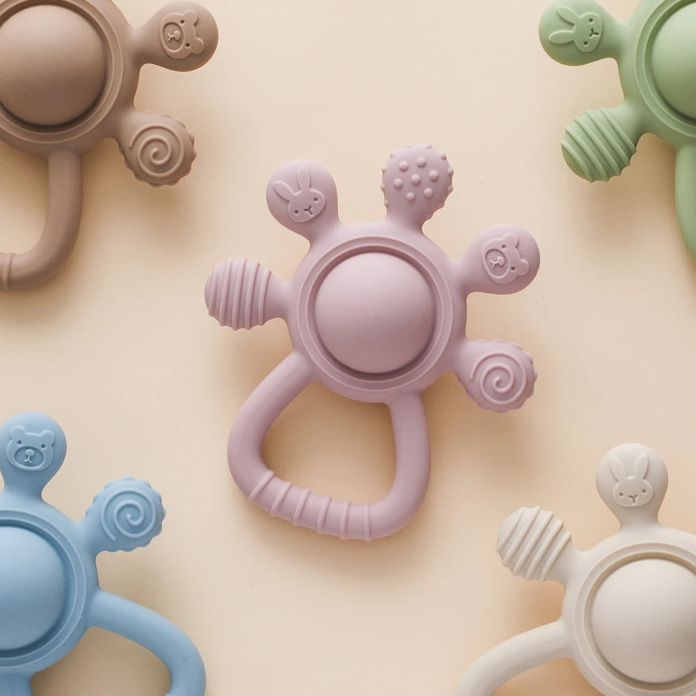 BPA Free Silicone Baby Teether — Sensory Rattle + Hand Bell | 0-12 Months