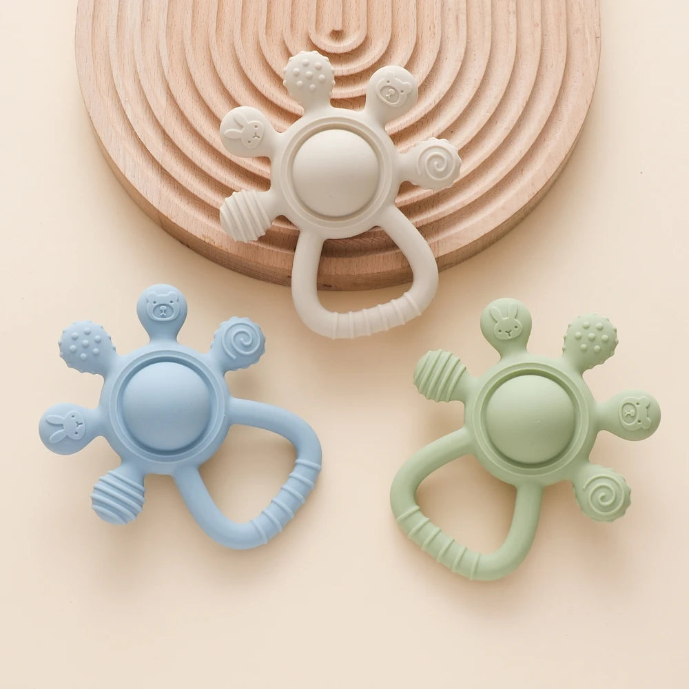 BPA Free Silicone Baby Teether — Sensory Rattle + Hand Bell | 0-12 Months